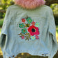 Blue cordory jacket with appliqued flowers.  Size L.