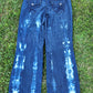 Wide-legged bleached stripe jeans.  Size 10. 32” inseam.