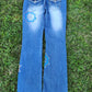 Jeans with painted metallic mandalas.  Size 7. 31” inseam.