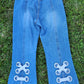 Capri jeans with grommets and ribbons.   Size 10.