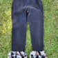 Black jeans with faux fur cuffs.  Size 10.