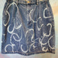 Short denim skirt, bleached swirls.  Size 10. 32” waist.