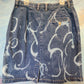 Short denim skirt, bleached swirls.  Size 10. 32” waist.