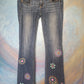 Jeans with metallic flower and paisley motif.   31 inseam. Size 2.