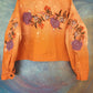 Cropped orange jean jacket, embroidered flowers.  Size XL.