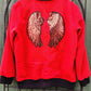 Red leterman jacket with wings.  Size S/M.