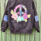 Letterman jacket with peace sign.  Size S