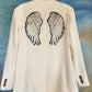 White blazer with wings.  Size L.